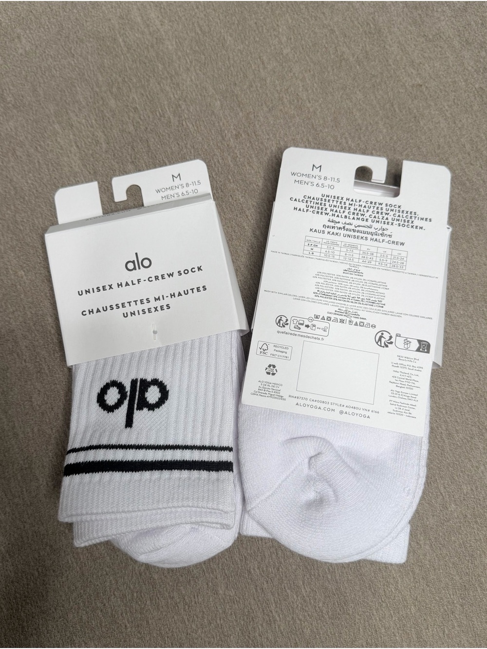ALO Yoga White Athletic Half-Crew Socks with Black Logo and Stripes